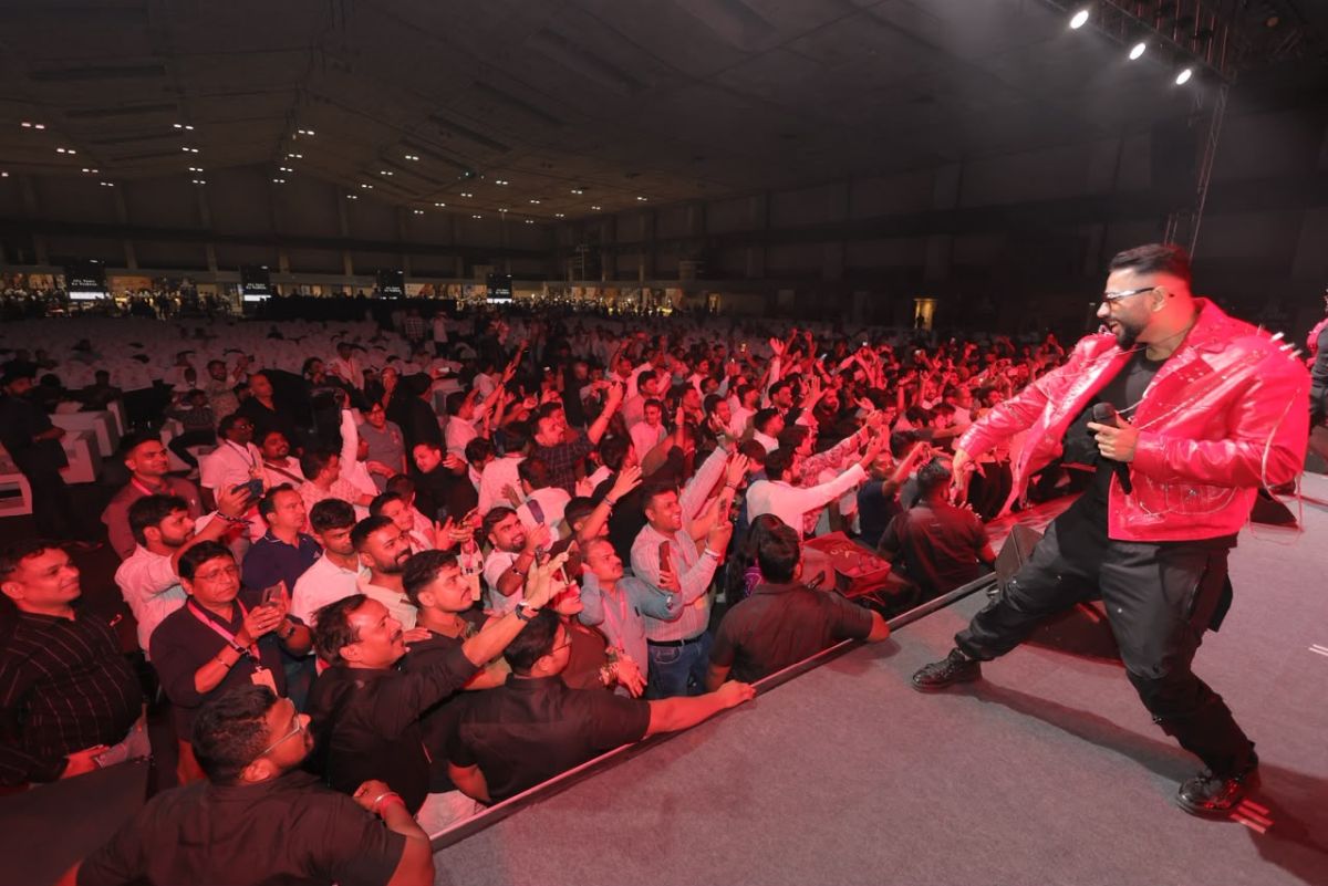 Singer performing to a packed crowd
